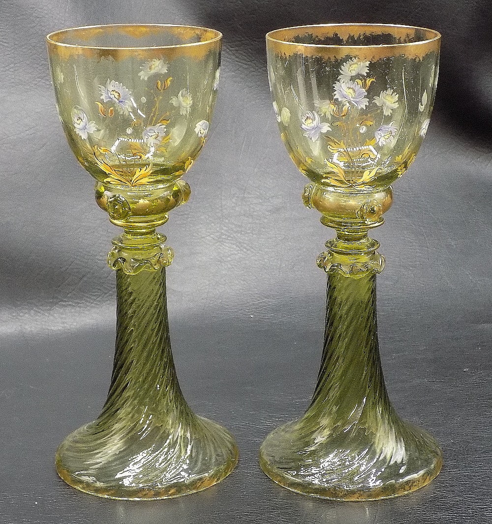 Two very lovely antique Moser decorated art glass wine glasses: Two very lovely antique Moser decorated art glass wine glasses beautiful colors. Hand painted. Great quality and detail. In very good original as found condition. 7 1/8 tall x 2 wide at top rims