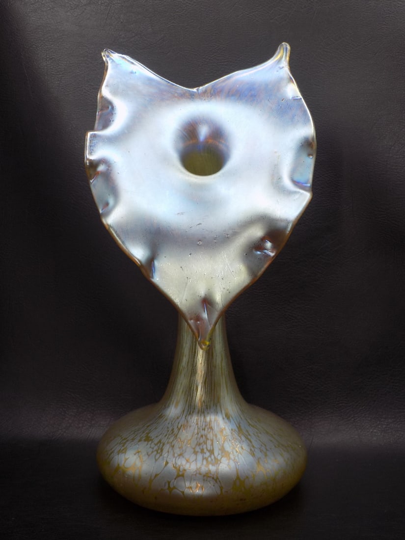 Fabulous vintage signed Loetz art glass Jack in the Pulpit vase: Fabulous vintage signed Loetz art glass Jack in the Pulpit vase. Beautiful iridescence. Beautiful colors. Great quality and detail. Signed on bottom as shown in photo. 12 inches tall x 6 wide at top c