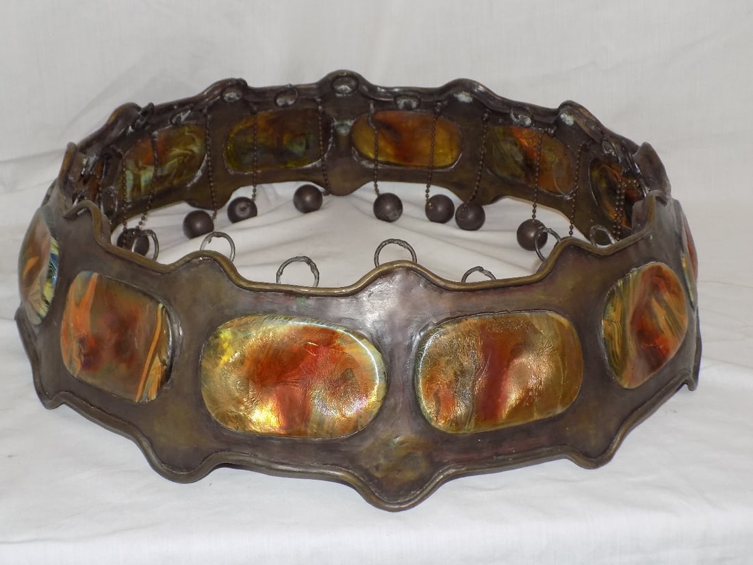 Magnificent antique Tiffany bronze with turtle back art glass inserts chandelier: Magnificent antique Tiffany bronze with turtle back art glass inserts chandelier. Twelve art glass turtle backs of exceptional quality as shown in photos. This appears to be part of a larger chandelie