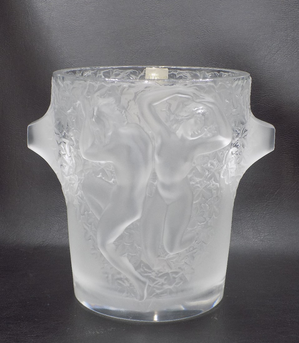 Magnificent signed Lalique Ganymede Dancing Nudes art glass Champaigne Wine or Ice Bucket: Magnificent signed Lalique Ganymede Dancing Nudes art glass Champaigne Wine or Ice Bucket. Marked with label. Great quality and detail. In very good original as found condition. 9 inches tall x 7 1/2 