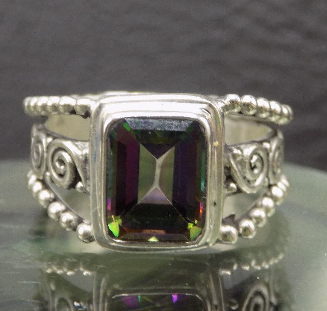 Beautiful 2 ct. mystic topaz sterling silver ring: Beautiful 2 ct. mystic topaz sterling silver ring. Size 8 1/2