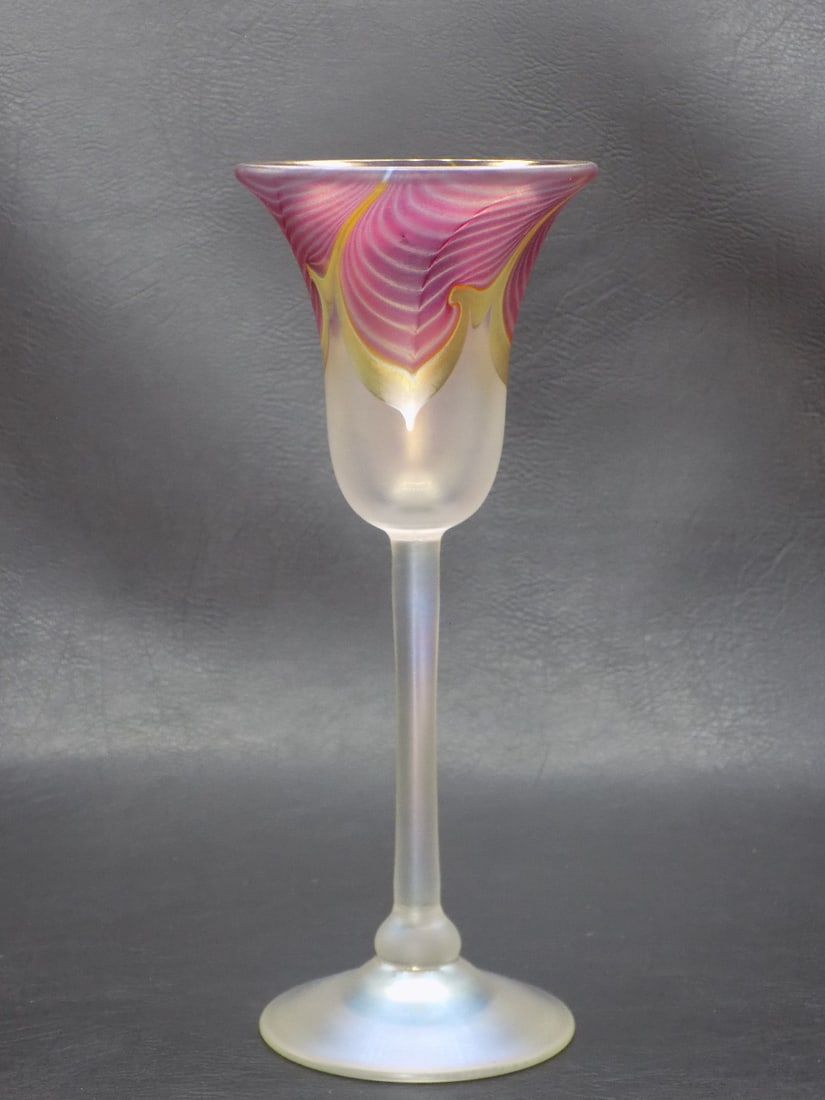 Fine midcentury modern artist signed art glass wine: Fine midcentury modern artist signed art glass wine glass. Artist signed Steven Correia as shown in photo. Pulled feather with beautiful iridescence. Great quality and detail. Beautiful colors. 8 1/2 