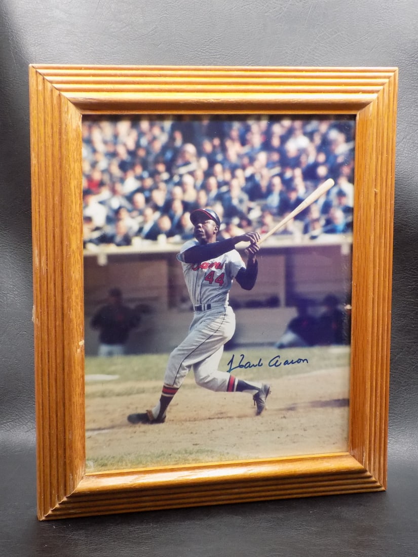 Hank Aaron autographed photograph with Certificate of Authenticity: Hank Aaron autographed photograph with Certificate of Authenticity. 10 inches x 8 inches. Frame 12 x 10. Please see photograph for condition and Certificate