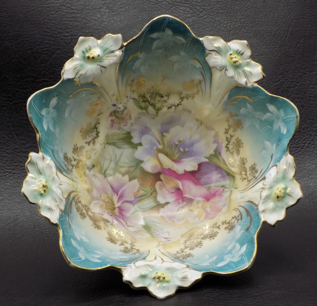Fancy antique small footed bowl. Delicate shape: Fancy antique small footed bowl. Delicate shape. Floral decorated with very beautiful colors. Hand painted. Blown out mold shape. Gold decorated rim and highlights. In very good original as found cond