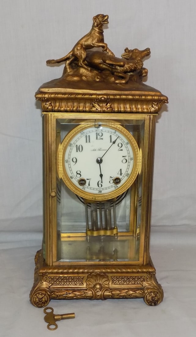 Antique figural Seth Thomas Crystal Regulator clock: Antique figural Seth Thomas Crystal Regulator clock. Running at time of listing. Marked on back of works as shown in photos. Porcelain dial. Looks to be bronze or brass. Original patina. Great quality
