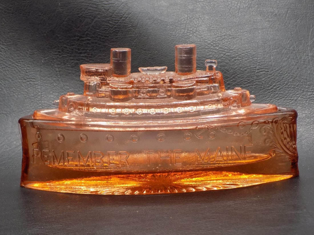 Neat vintage Remember the Maine pink covered candy container: Neat vintage Remember the Maine pink covered candy container. Great quality and detail. In very good original as found condition. 7 inches long x 2 ½ wide x3 ½ tall