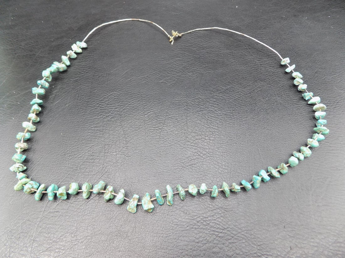 Nice looking Native American Indian turquoise necklace: Nice looking Native American Indian turquoise necklace. Beautiful colors. Great quality and detail. measures 27 inches long