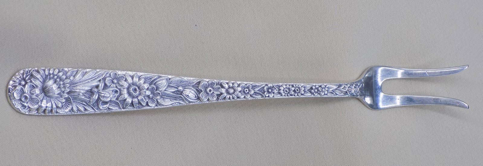Ornate vintage Kirk and Son sterling silver horderve fork: Ornate vintage Kirk and Son sterling silver horderve fork. Marked as shown in photo. Great quality and detail. In very good original as found condition. Please see photos. 5 ½ long. 21.5 grams