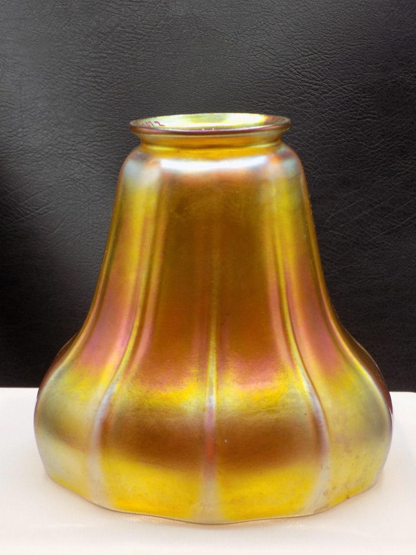 Beautiful antique Steuben art glass shade.: Beautiful antique Steuben art glass shade. No signature. Beautiful iridescence. Great quality and detail. In very good original as found condition. Please see photos. 4 ¾ inches tall. Fitter rim