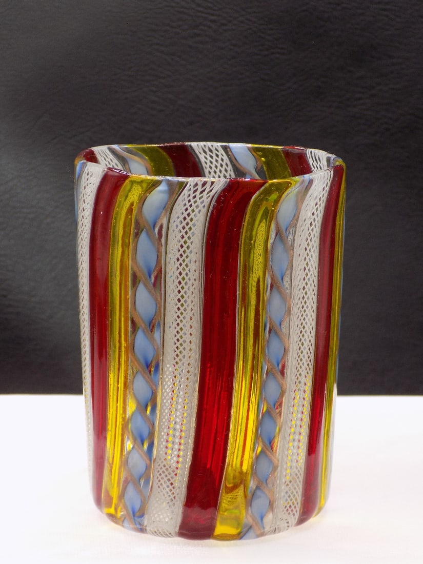 Beautiful midcentury Venetian Murano art glass vase: Beautiful midcentury Venetian Murano art glass vase. Latticino ribbon glass with gold dust twist in vibrant colors. Great quality and detail. In very good original as found condition. Please see photo