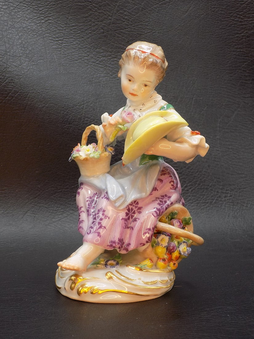 Charming antique Meissen porcelain figure of girl with flowers: Charming antique Meissen porcelain figure of girl with flowers. Signed on bottom as shown in photos. Beautiful hand decorated colors. Great quality and detail. In very good original as found condition