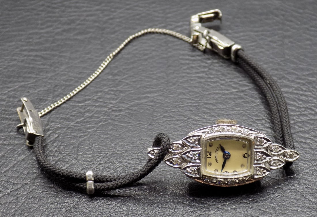 Vintage Hamilton 911 17 jewel gold and diamond wristwatch: Vintage Hamilton 911 17 jewel gold and diamond wristwatch. No marking. Running at time of listing 5 ¾ inches long. Please see photos for serial numbers