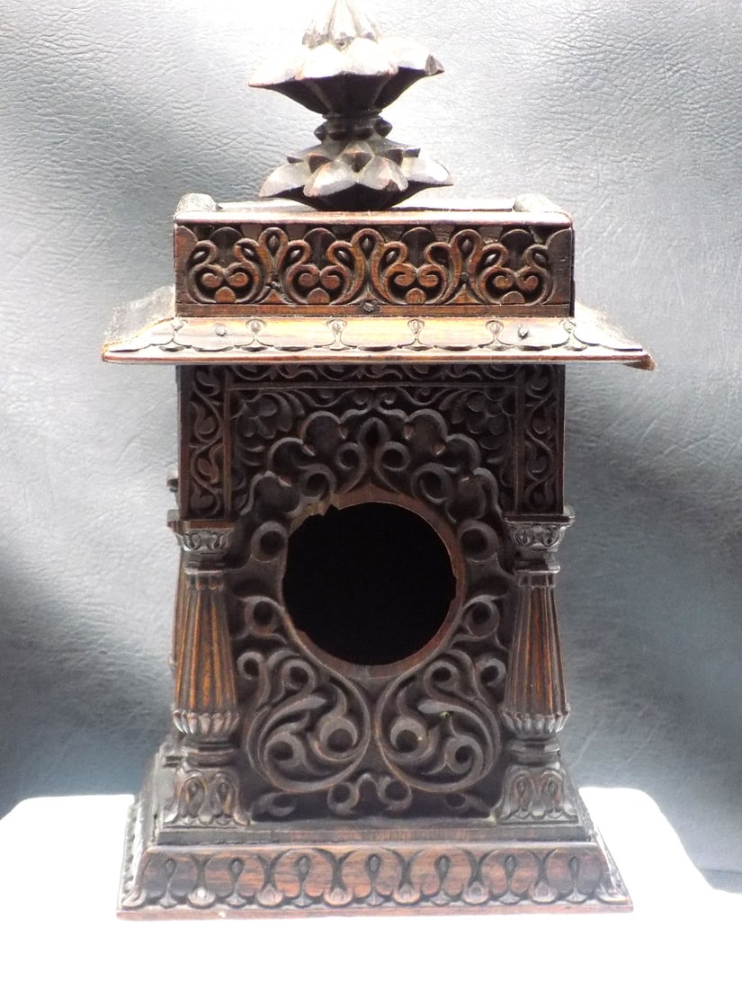 Exceptional antique carved wood pocket watch holder: Exceptional antique carved wood pocket watch holder. Heavily carved. Has original key to lock back door. Original finish. Great quality and detail. In very good original as found condition. Please see