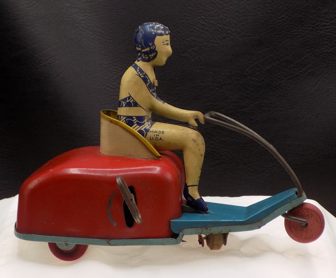 Antique key wind tin toy with Girl on Scooter (1 of 8)