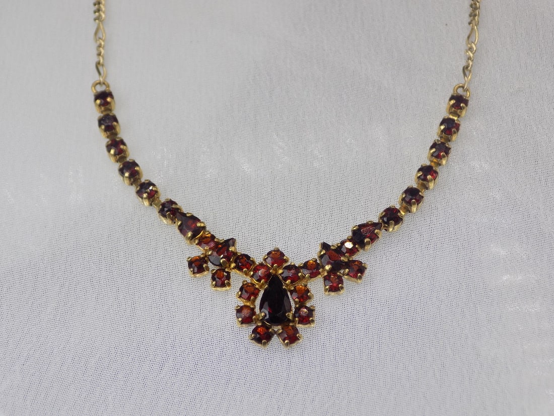 Beautiful vintage garnets and sterling with gold wash necklace: Beautiful vintage garnets and sterling with gold wash necklace. Marked as shown in photos. Great quality and detail. Please see photos. 20 inches total length