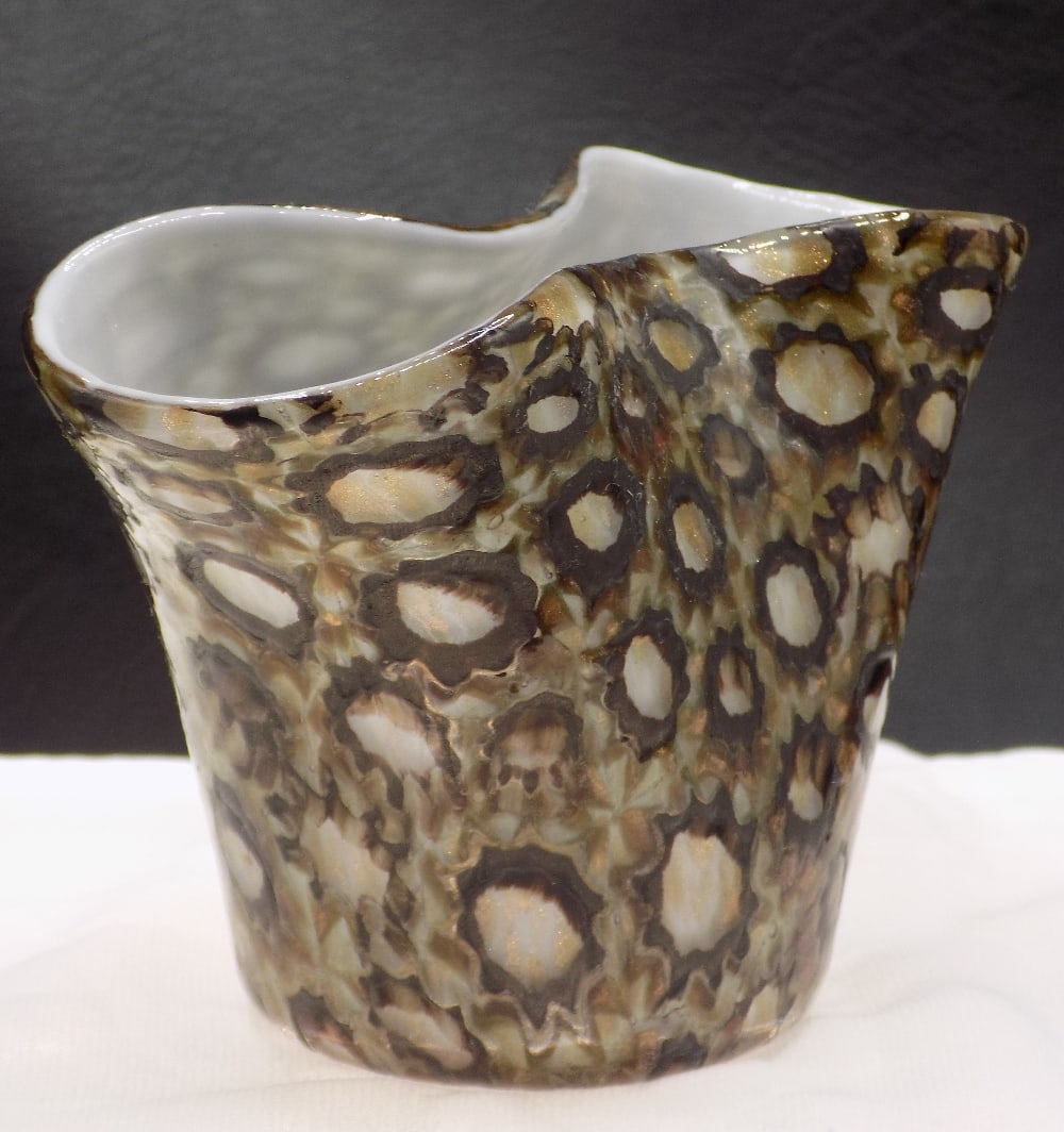 Beautiful midcentury Murano millefiori and gold dust art glass vase: Beautiful midcentury Murano millefiori and gold dust art glass vase. Cased over white glass. Great quality and detail. In very good original as found condition. Please see photos. 3 1/8 inches tall x 