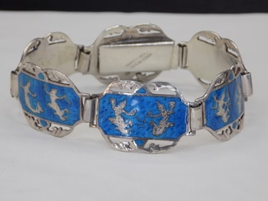 Beautiful enamel decorated vintage sterling silver bracelet