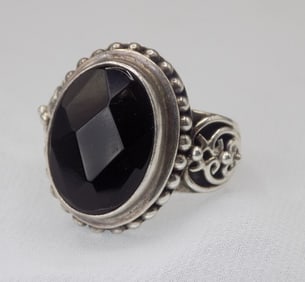 Mans sterling silver ring with faceted stone