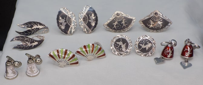 Seven beautiful pairs of vintage sterling silver earrings