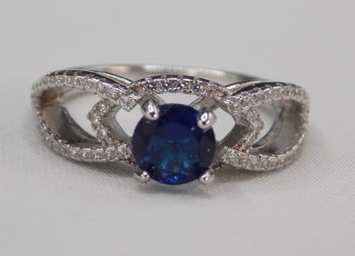 Beautiful 1 cwt blue sapphire and topaz sterling silver ring
