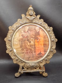 Fabulous antique cast iron picture frame.