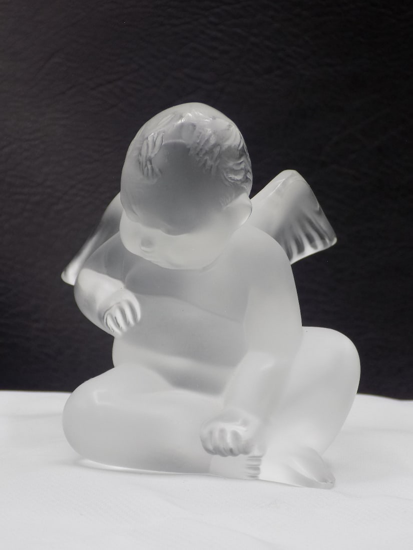 Beautiful vintage signed Lalique art glass winged angel Capriccioso in original box.: Beautiful vintage signed Lalique art glass winged angel Capriccioso in original box. Signed in script as shown in photos. In very good original as found condition. Great quality and detail. 2 5/8 inch