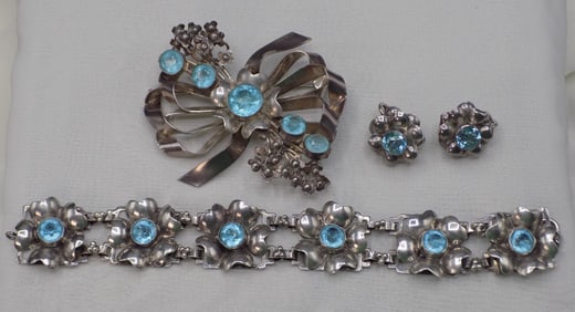 Vintage signed Hobe sterling silver bracelet, broach and earrings.