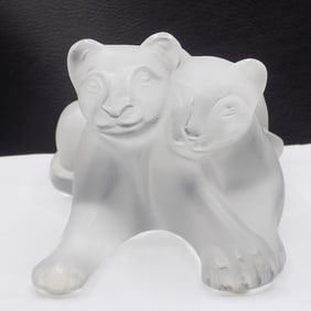 Beautiful vintage signed Lalique Tambwee art glass lion cubs in original box.