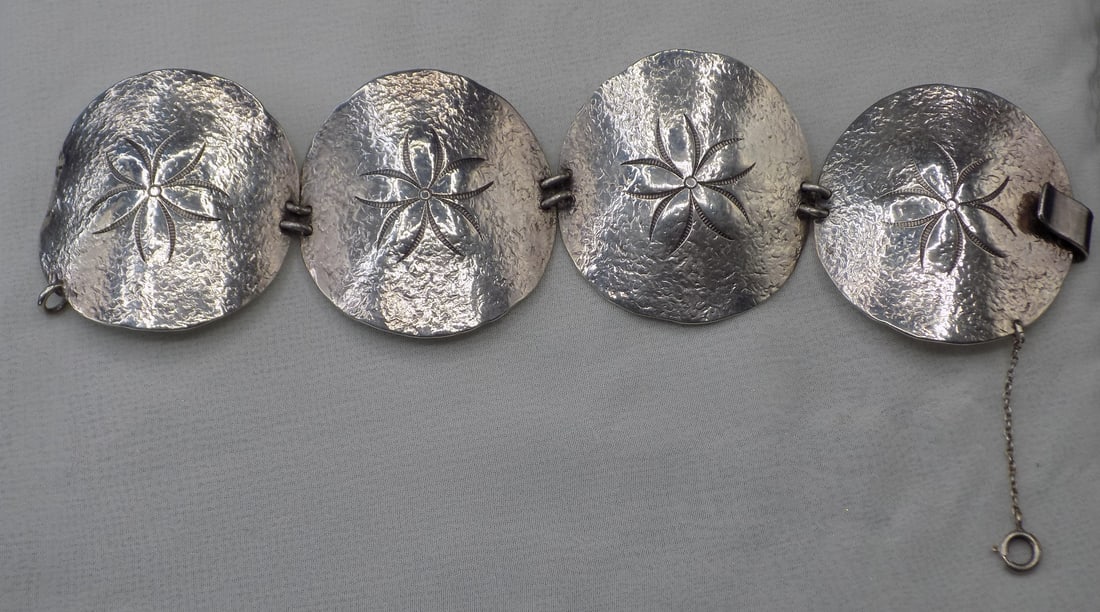 Vintage Clifford and Russell sterling silver bracelet: Vintage Clifford and Russell sterling silver bracelet. Marked as shown in photo. In very good original as found condition. Great quality and detail. 6 ¾ inches long. 55 grams.