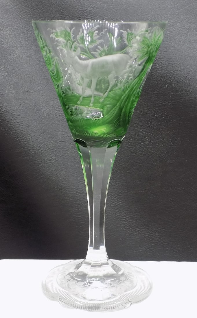 Outstanding Moser cameo art glass wine glass: Outstanding Moser cameo art glass wine glass. Cameo cut green to clear with deer in forest. Beautiful colors. Great quality and detail. In very good original as found condition. White dotted light is