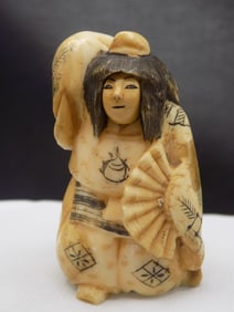 Fine vintage carved Oriental Netsuke with rotating face