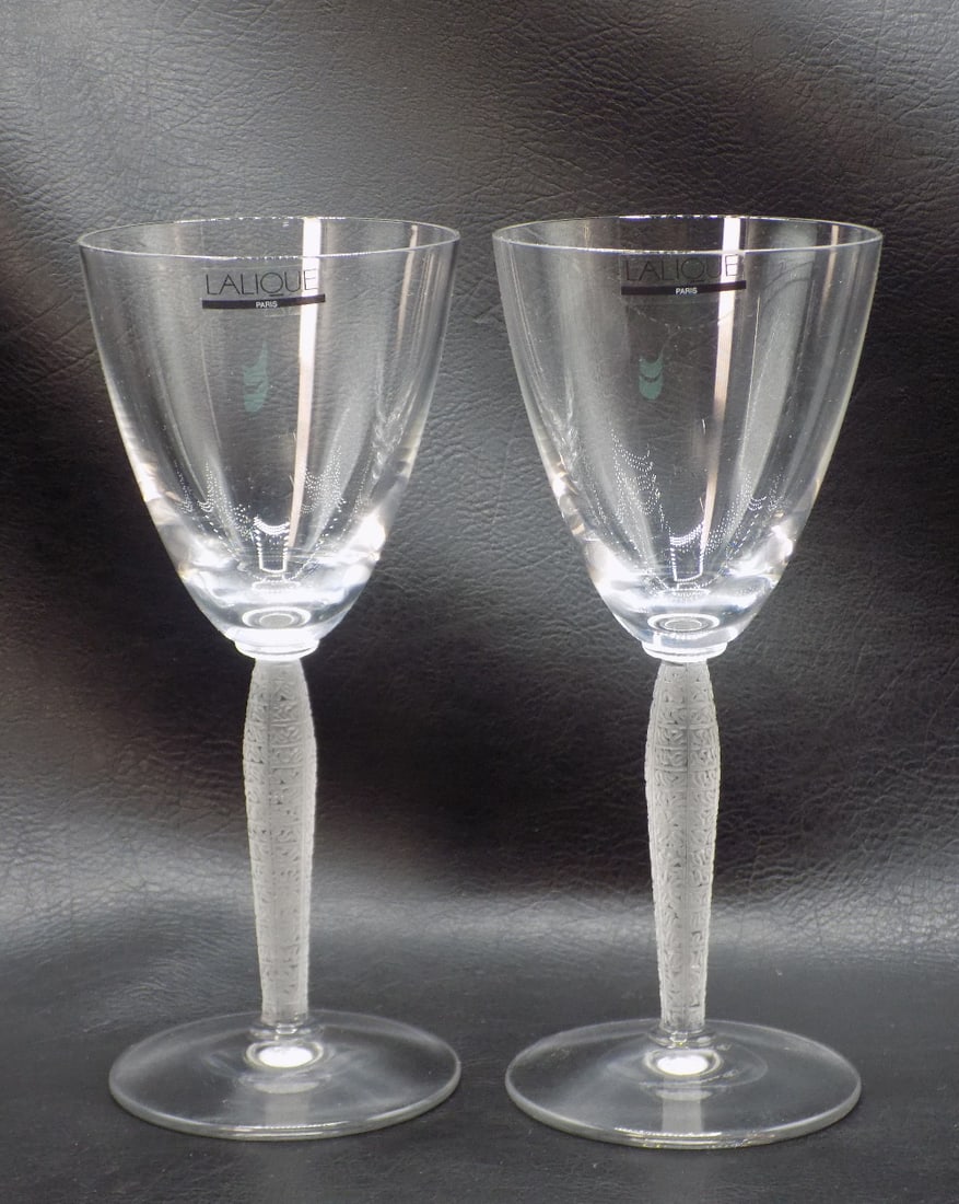 Beautiful pair of vintage signed R Lalique Louvre wine glasses: Beautiful pair of vintage signed R Lalique Louvre wine glasses. Original label and signed in script as shown in photo. Great quality and detail. In very good original as found condition. 7 1/4 inches 