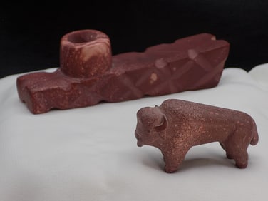 Vintage catlinite pipe and buffalo.