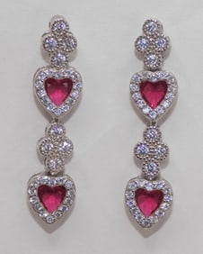 Beautiful pair of ruby and white topaz sterling silver earrings