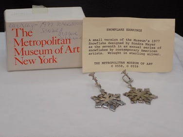 Vintage sterling silver snowflake earrings designed by Sondra Mayer