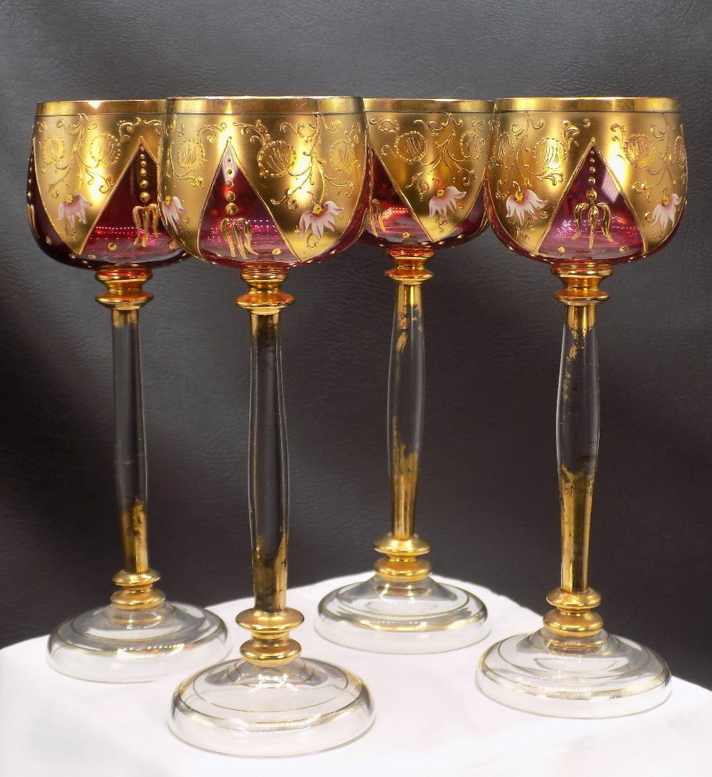 Set of four lovely vintage enamel decorated Moser wine glasses: Set of four lovely vintage enamel decorated Moser wine glasses. Beautiful decorated stemware with flowers. Beautiful colors. Center stems are clear, dark background makes the stem look black. Great qu