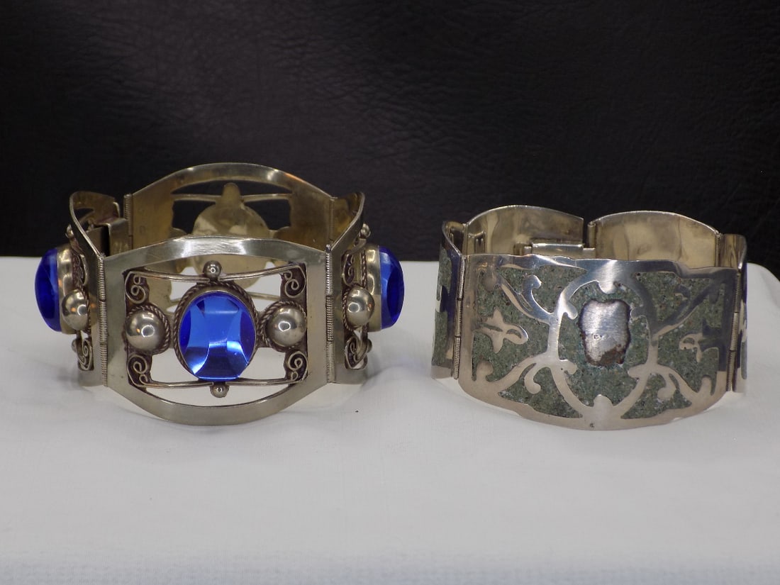 Two very nice vintage sterling silver Mexico bracelets: Two very nice vintage sterling silver Mexico bracelets. Marked as shown in photos. Great quality and detail. In very good original as found condition. With one blue stone has minor flake as shown in p
