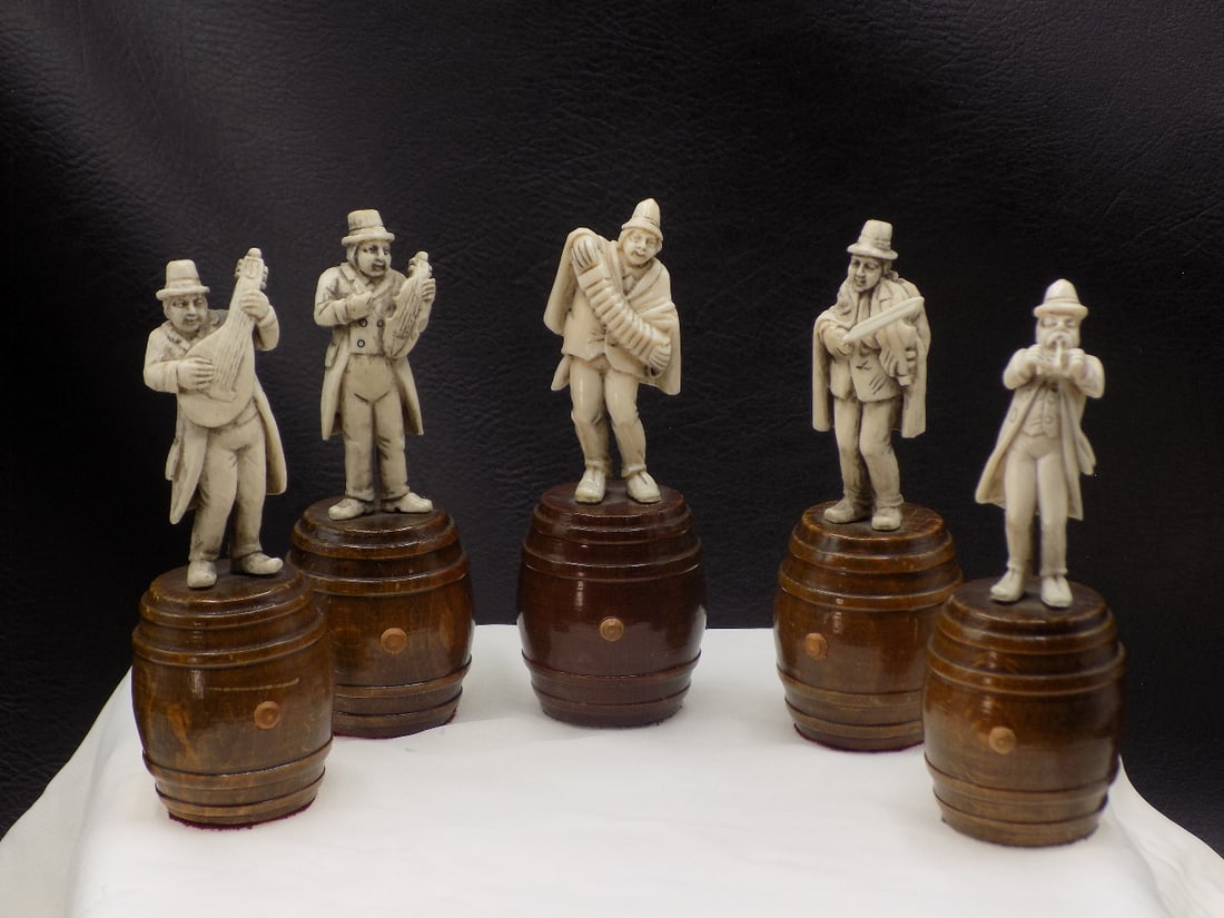 Finely carved antique German band standing on wood barrels (1 of 7)
