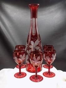 Exceptional vintage cranberry cut to clear decanter and five stemware glasses