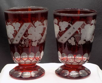 Exceptional vintage cranberry cut to clear pair of glasses.