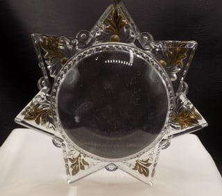 Unusual vintage snowflake design magnifying paperweight.