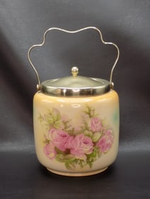 Vintage rose decorated cracker jar.