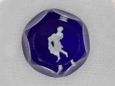 Beautiful vintage art glass paperweight with classical figure pouring water.