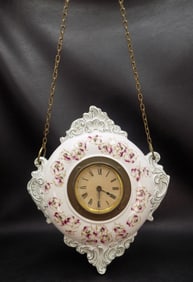 Lovely antique floral decorated porcelain clock.