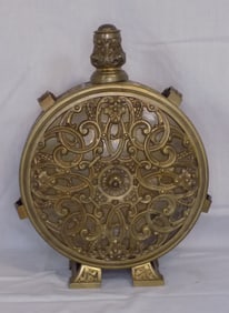 Ornate antique bronze decorated gun powder container or flask