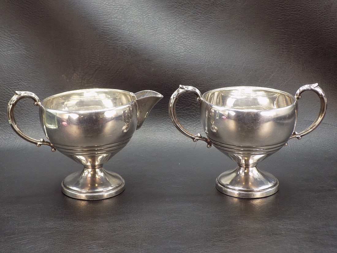 Very nice vintage sterling silver creamer and sugar: Very nice vintage sterling silver creamer and sugar. Marked on bottom as shown in photos. Great quality and detail. In very good original as found condition. 207 grams total weight. Sugar bowl 3 5/8 i