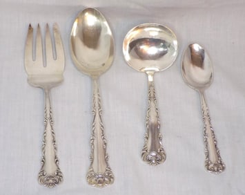 Four serving pieces of Frank Whiting Neapolitan Kings Court 1895 sterling silver serving pieces