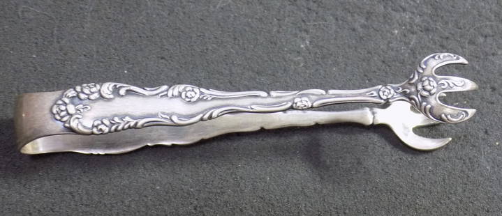 Ornate antique sterling silver sugar tongs: Ornate antique sterling silver sugar tongs. Dated 1892. Marked as shown in photos. Great quality and detail. 3 ¼ inches. 21 grams