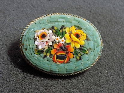 Vintage micro mosaic pin: Vintage micro mosaic pin. Beautiful colors. Great quality and detail. Marked Italy. 1 ¼ inches wide.