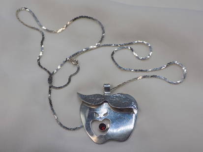 Signed sterling Ruth Roach pendant and garnet necklace: Signed sterling Ruth Roach pendant and garnet necklace. Marked as shown in photos. In very good original as found condition. Great quality and detail. Pendant 1 7/8 inches tall. Chain 23 inches long.